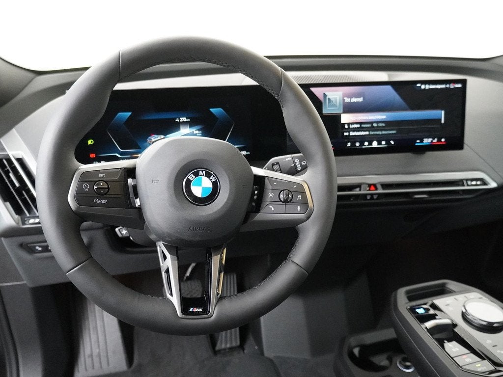 BMW iX xDrive40 | SoH 100% | Sportpakket | Glazen Panoramada, Auto's, BMW, Stof, Gebruikt, Zwart, Met garantie (alle)