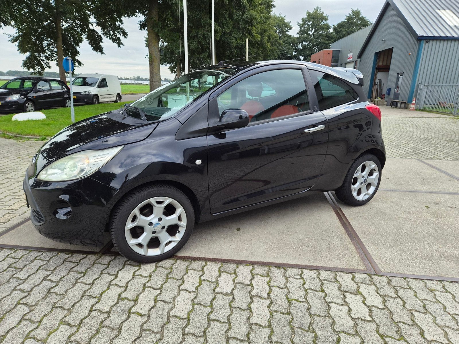 Ford Ka 1.2 51KW 2010 Zwart, Auto's, Voorwielaandrijving, 1242 cc, 4 cilinders, 4 stoelen