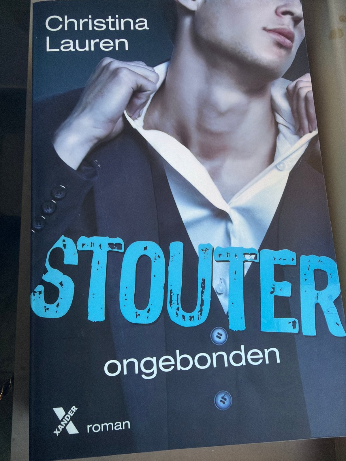 Stouter Ongebonden - Christina Lauren (Roman), Ophalen of Verzenden, Gelezen, Nederland