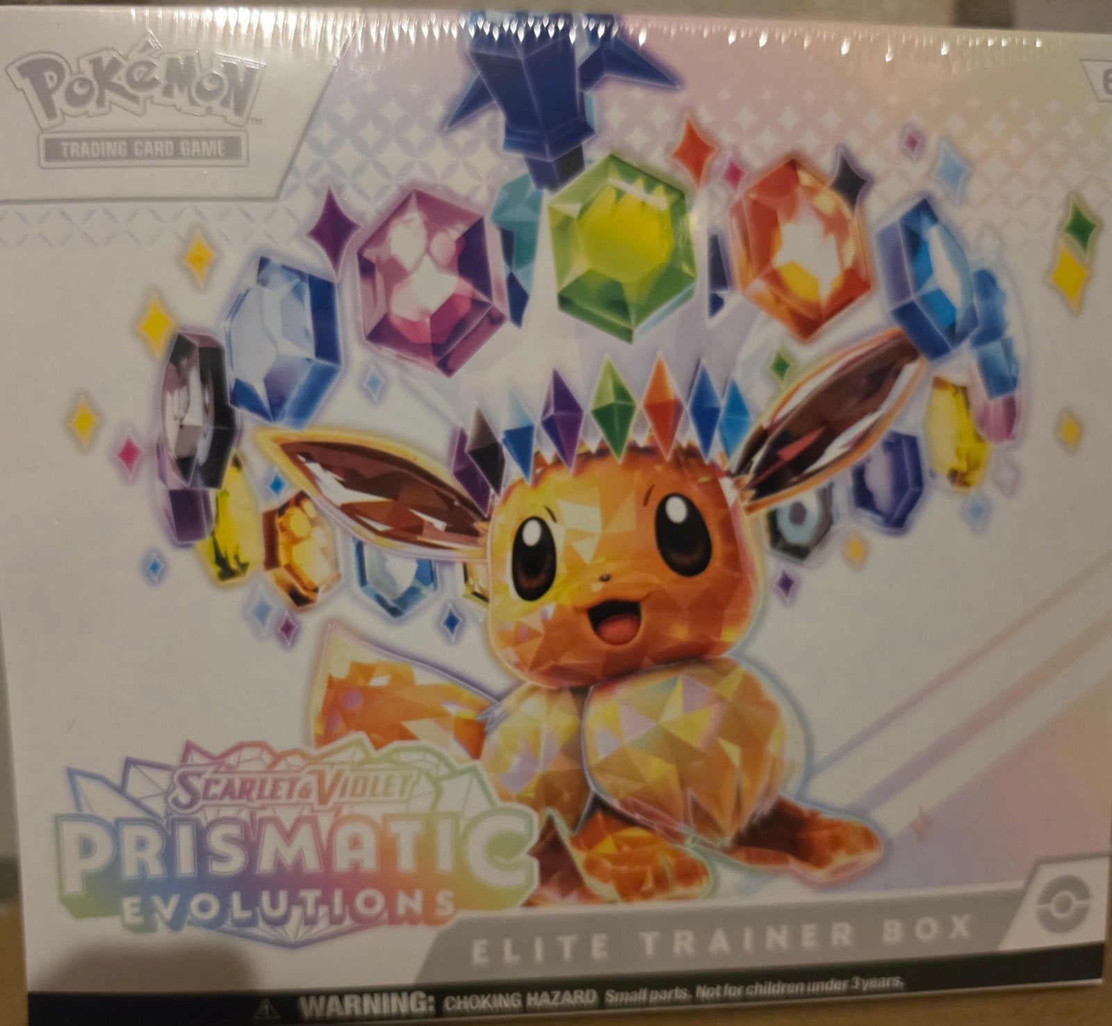 Pokémon Scarlet & Violet Prismatic Evolutions Elite Trainer, Hobby en Vrije tijd, Ophalen of Verzenden, Nieuw, Overige typen