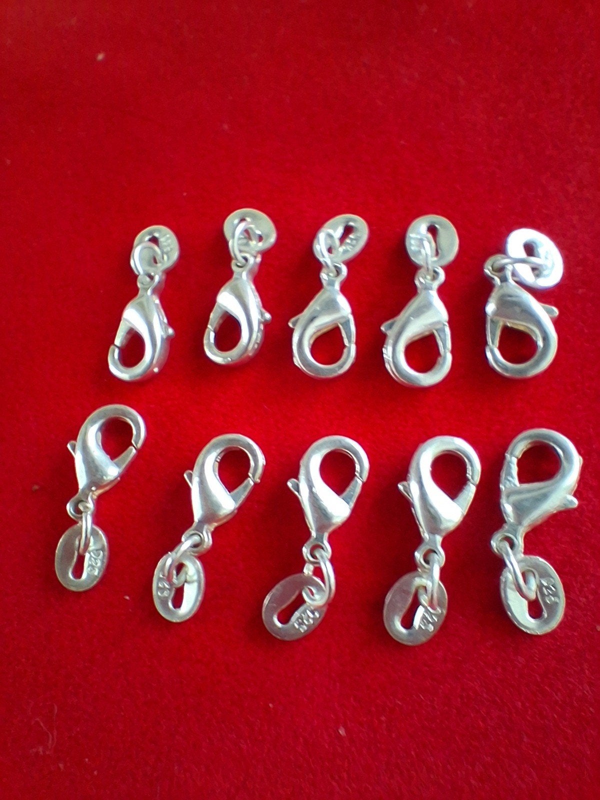 10 zilveren slotjes, Ophalen of Verzenden, Zo goed als nieuw, Zilver