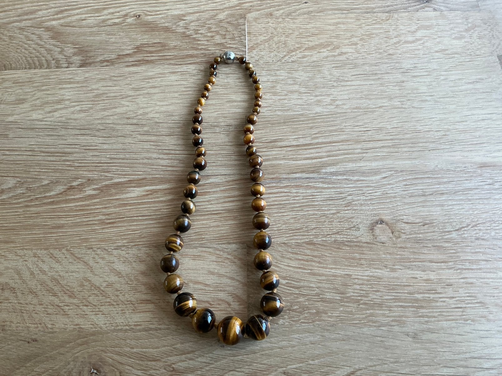 Tijgeroog ketting, aflopende maat kralen., Sieraden, Tassen en Uiterlijk, Kettingen, Ophalen of Verzenden, Zo goed als nieuw, Bruin