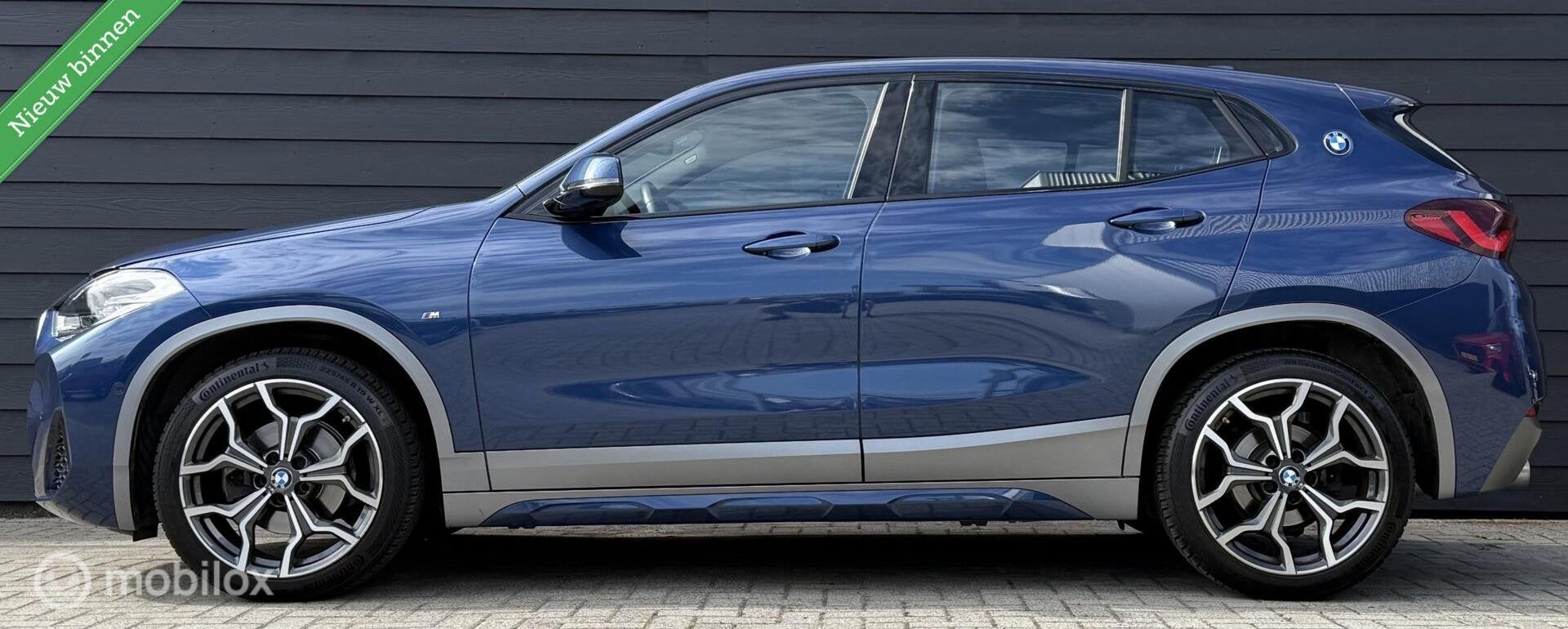 BMW X2 sDrive18i Executive M-Sport Kuipstoel/LED/Winterpakke, Voorwielaandrijving, Gebruikt, Met garantie (alle), Leder