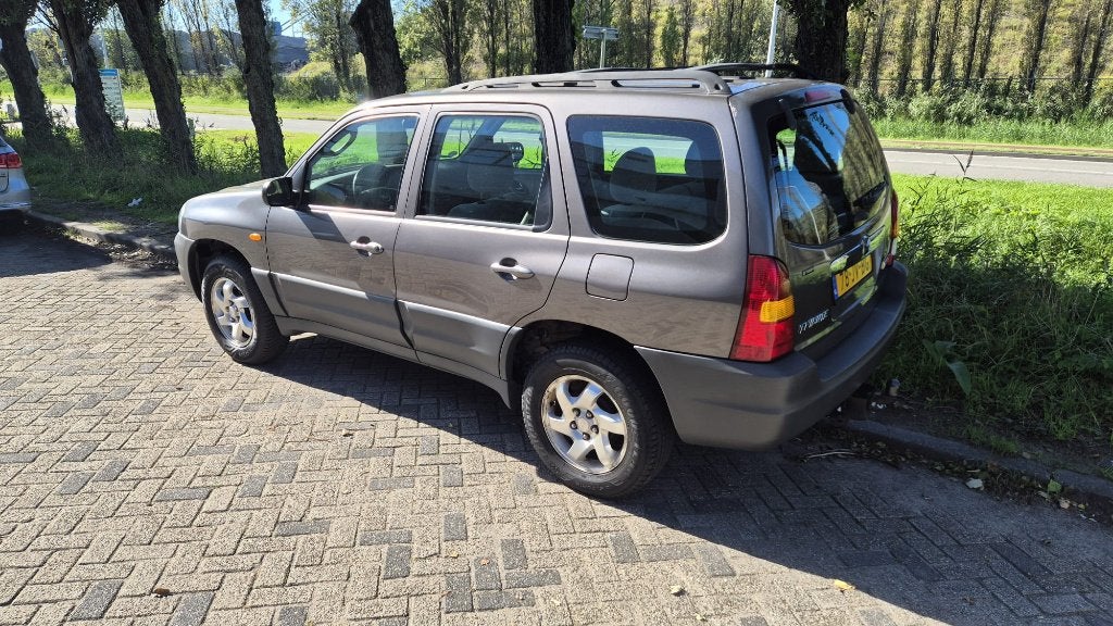 Mazda Tribute 2.0 Exclusive 4WD 2002 Grijs, Auto's, 745 kg, Stof, 4 cilinders, 123 pk