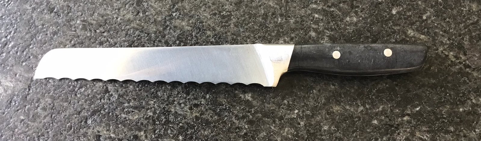 Broodmes Jamie Oliver 33,5 cm zwart handvat, Huis en Inrichting, Los bestek, Ophalen of Verzenden, Zo goed als nieuw, Rvs of Chroom