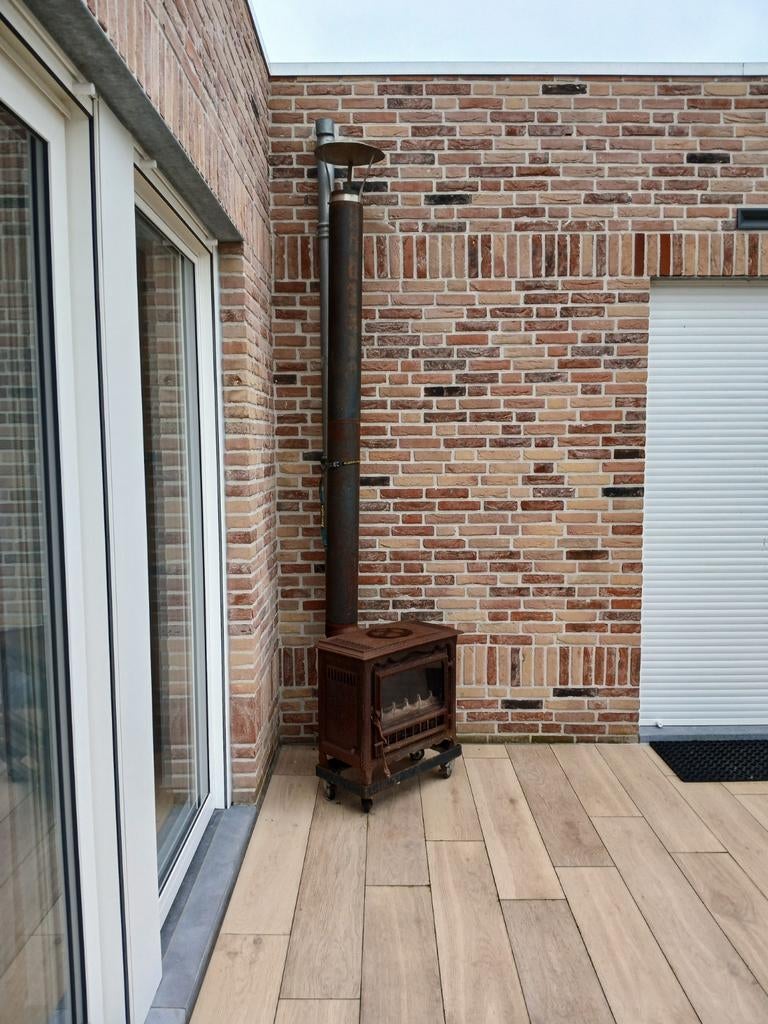 Gietijzeren tuinhaard met 2 meter deelbare kachelpijp., Tuin en Terras, Ophalen of Verzenden, Gebruikt