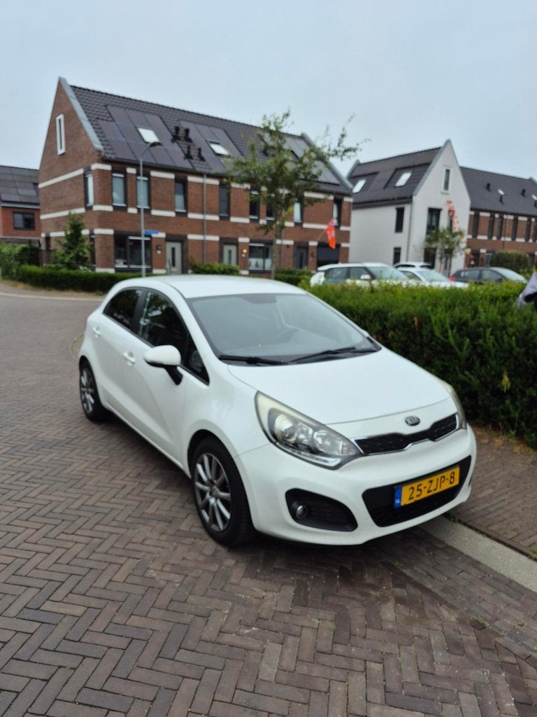 Kia Rio 1.2 I 5DRS  I 2012 I Airco I Dealer Onderhouden, Auto's, Kia, Particulier, Rio, ABS, Airbags, Airconditioning, Bluetooth