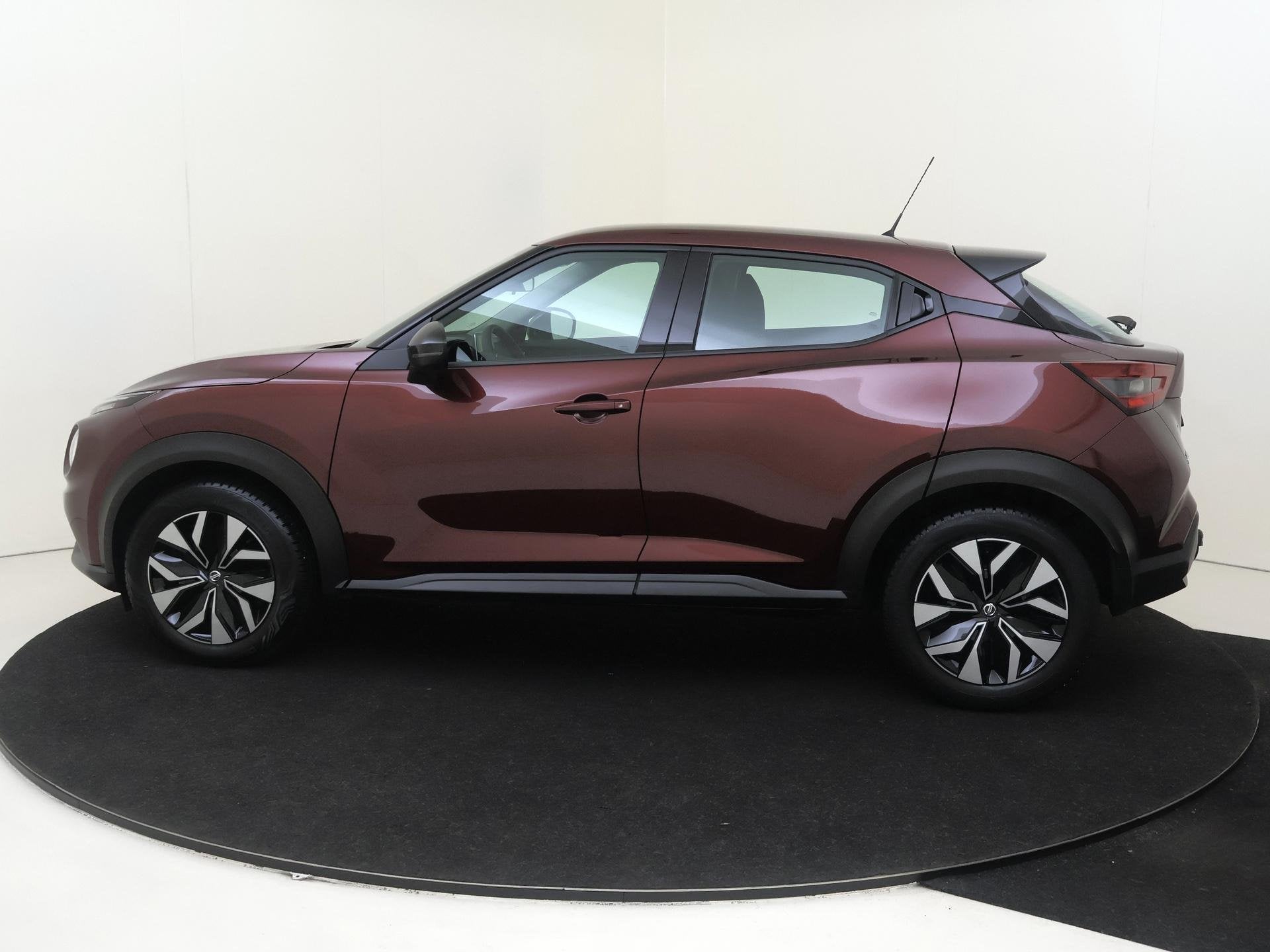 Foto 8 van Nissan Juke 1.0 DIG-T Acenta | Achteruitrijcamera | Wieldopp