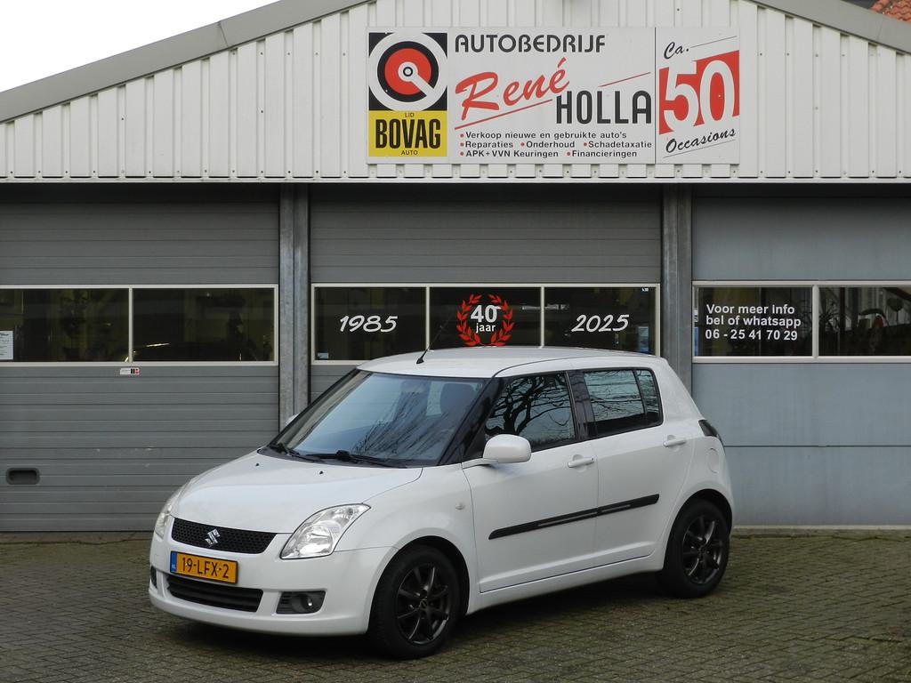 Suzuki Swift 1.3 5Deurs Cool Airco CV afst Isofix LMV Reserv, Auto's, Voorwielaandrijving, Stof, Zwart, 400 kg