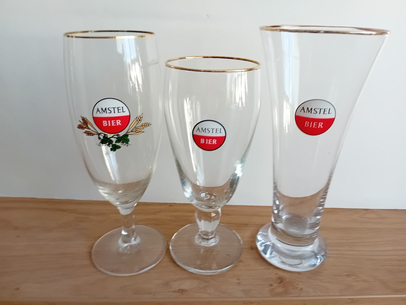 11 oudere Amstel glazen, Ophalen of Verzenden, Zo goed als nieuw, Glas of Glazen, Amstel
