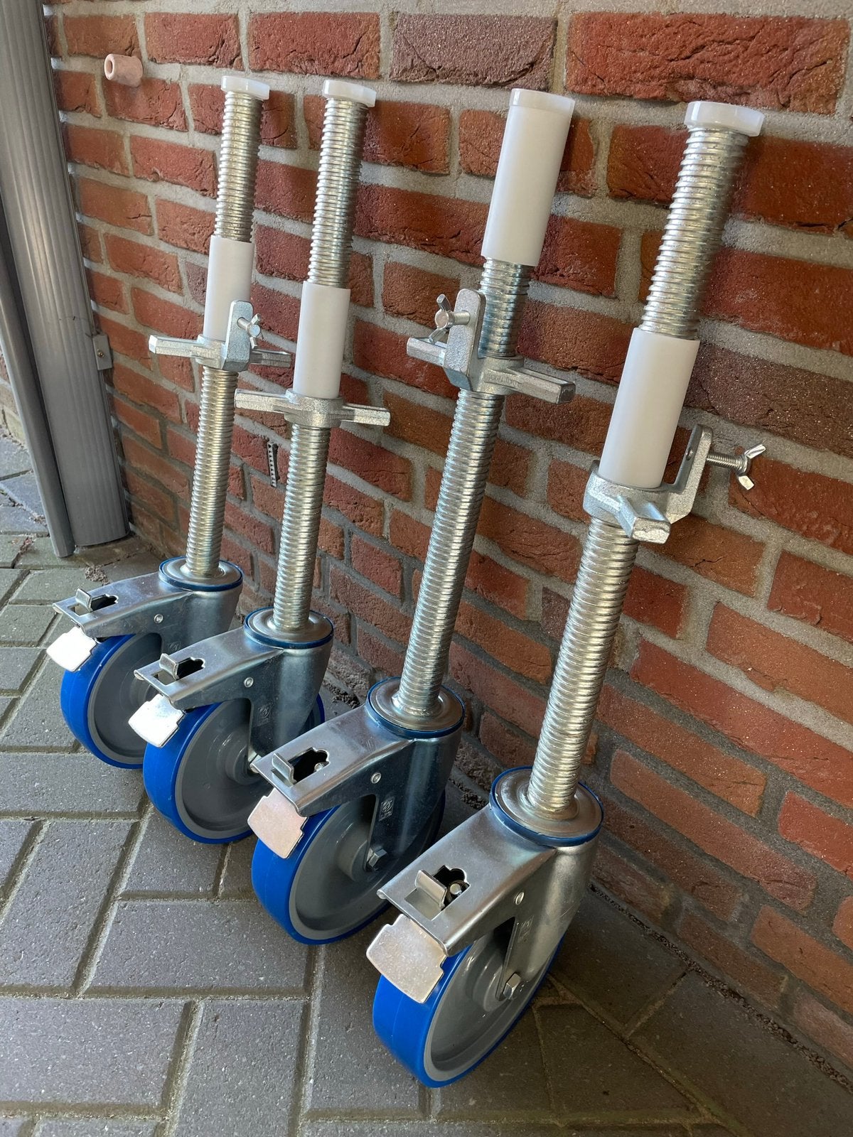 4 Nieuwe dubbel geremde steigerwielen, Doe-het-zelf en Verbouw, Steigers, Ophalen, Nieuw, Rolsteiger of Kamersteiger, 5 meter of hoger