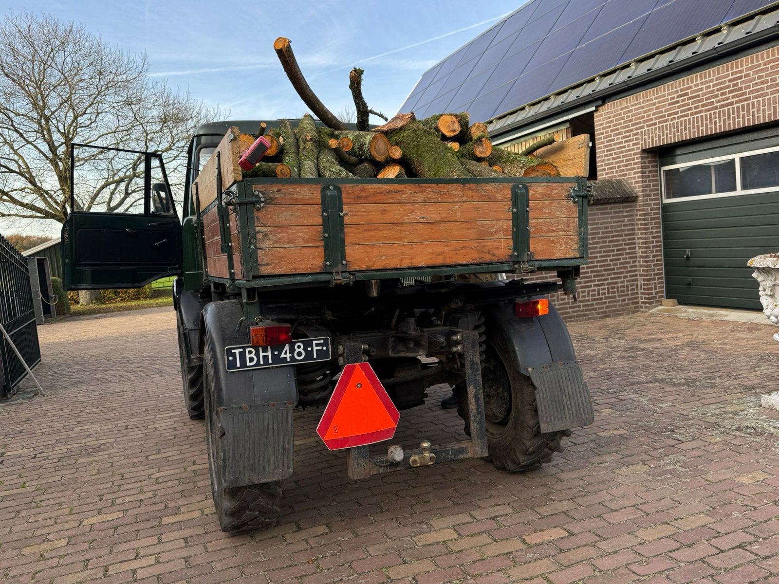 Zeer nette unimog, Ophalen, Veehouderij, Weidebouw
