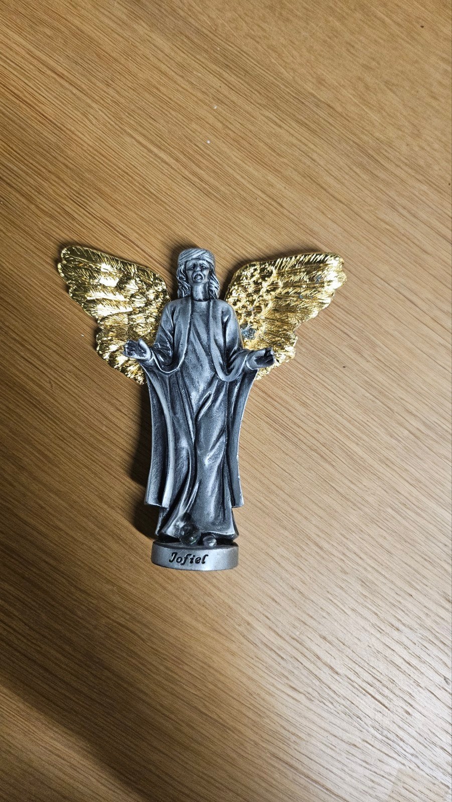 Jofiel Engel Beeldje met Gouden Vleugels, Ophalen