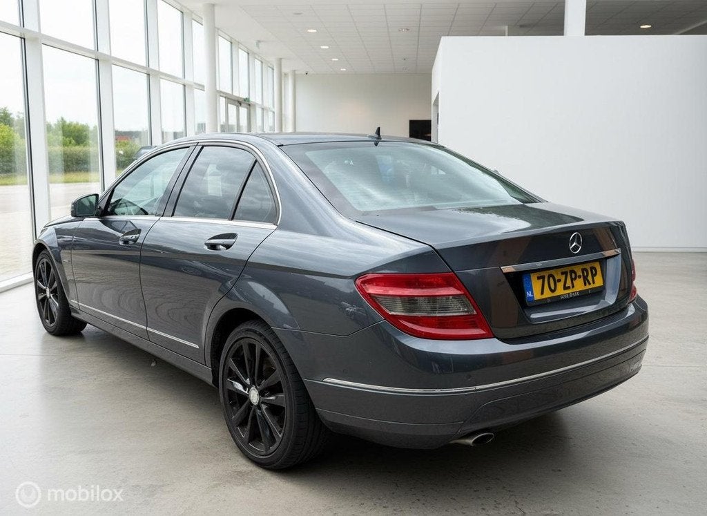 Mercedes C-klasse 200 K Business Aut|Airco|Leder|Navi, Auto's, Achterwielaandrijving, 4 cilinders, 1796 cc, Origineel Nederlands