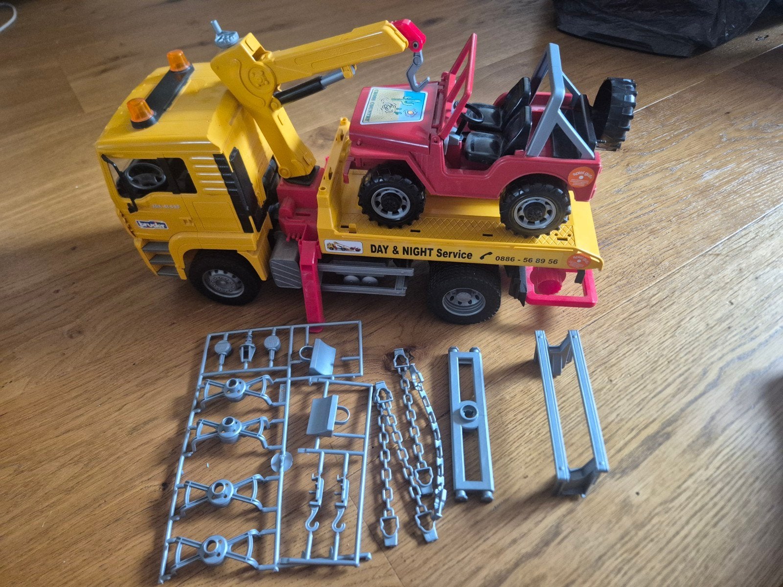 Bruder 02750 MAN TGA takelwagen met jeep 1:16, Ophalen of Verzenden