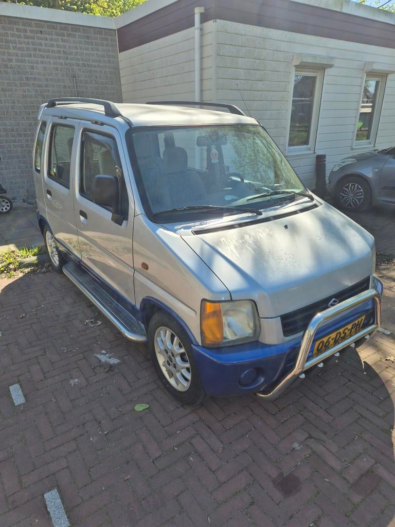 Suzuki Wagon R+ 1.2 1999 Grijs met blauwe accenten, Auto's, Suzuki, Voorwielaandrijving, Stof, 4 cilinders, USB