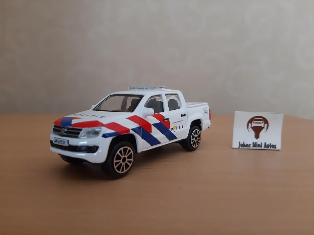 Volkswagen Amarok 2011 Politie NL van Bburago 1:43, Hobby en Vrije tijd, Modelauto's | 1:43, Overige merken, Auto, Nieuw, Ophalen of Verzenden