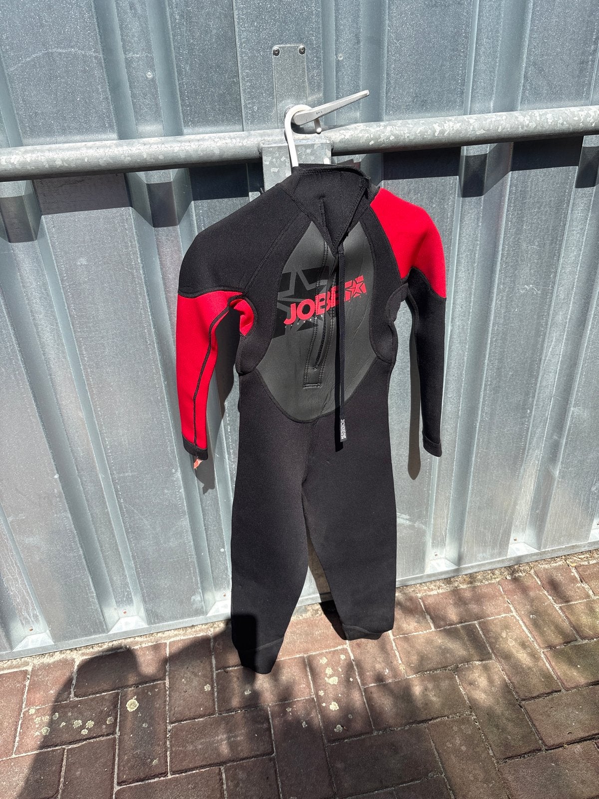 Jobe Rebel Wetsuit Kinderen Zwart/Rood Maat L, Watersport en Boten, Ophalen of Verzenden, Gebruikt, Kind, Wetsuit