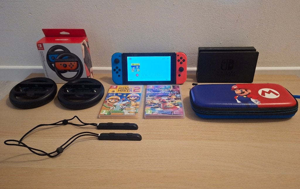 Nintendo Switch 1, Ophalen, Met games, Met 2 controllers, Zo goed als nieuw
