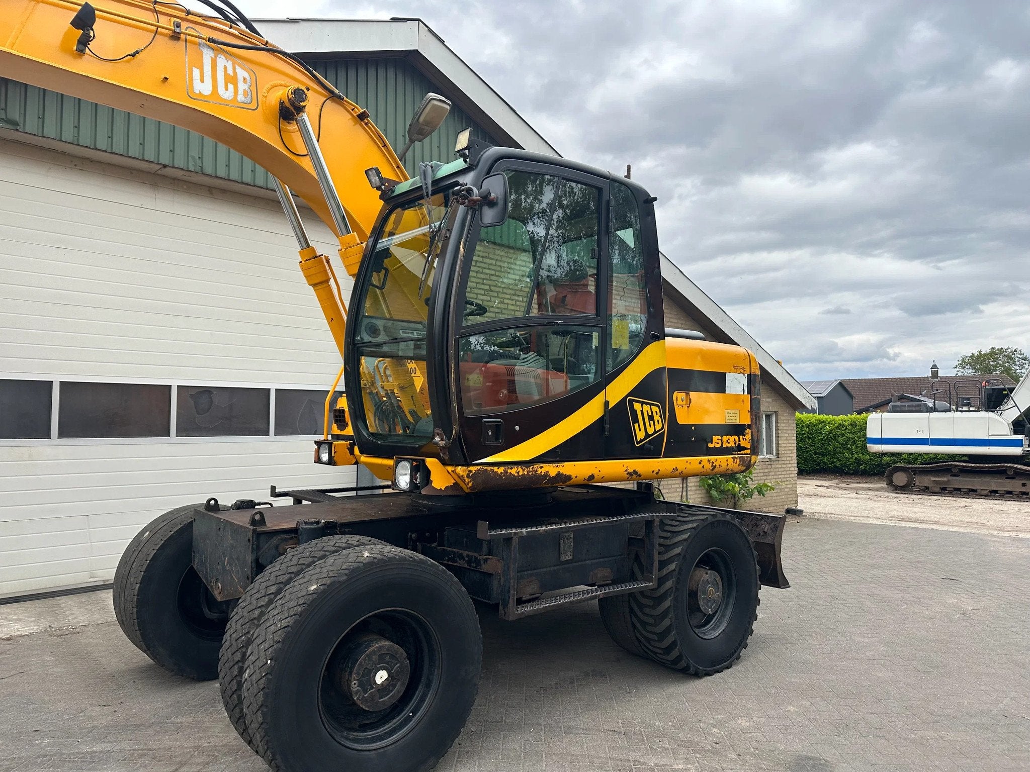JCB JS130W (bj 1998), Zakelijke goederen, Machines en Bouw | Kranen en Graafmachines, Graafmachine