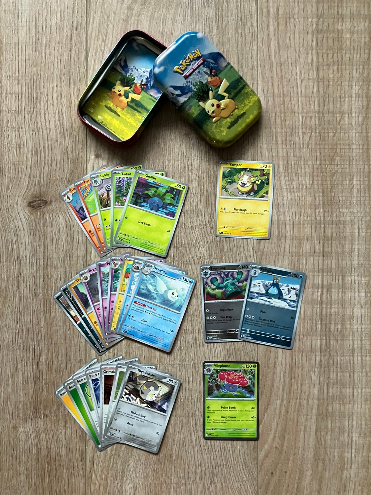 Pikachu & Tepig mini tin en een setje van 25 Pokémon kaarten, Ophalen of Verzenden, Zo goed als nieuw, Meerdere kaarten, Foil