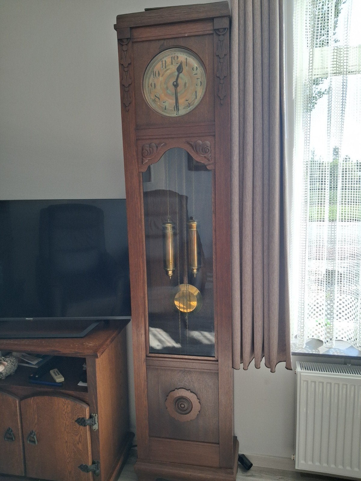 Antieke staande klok., Ophalen