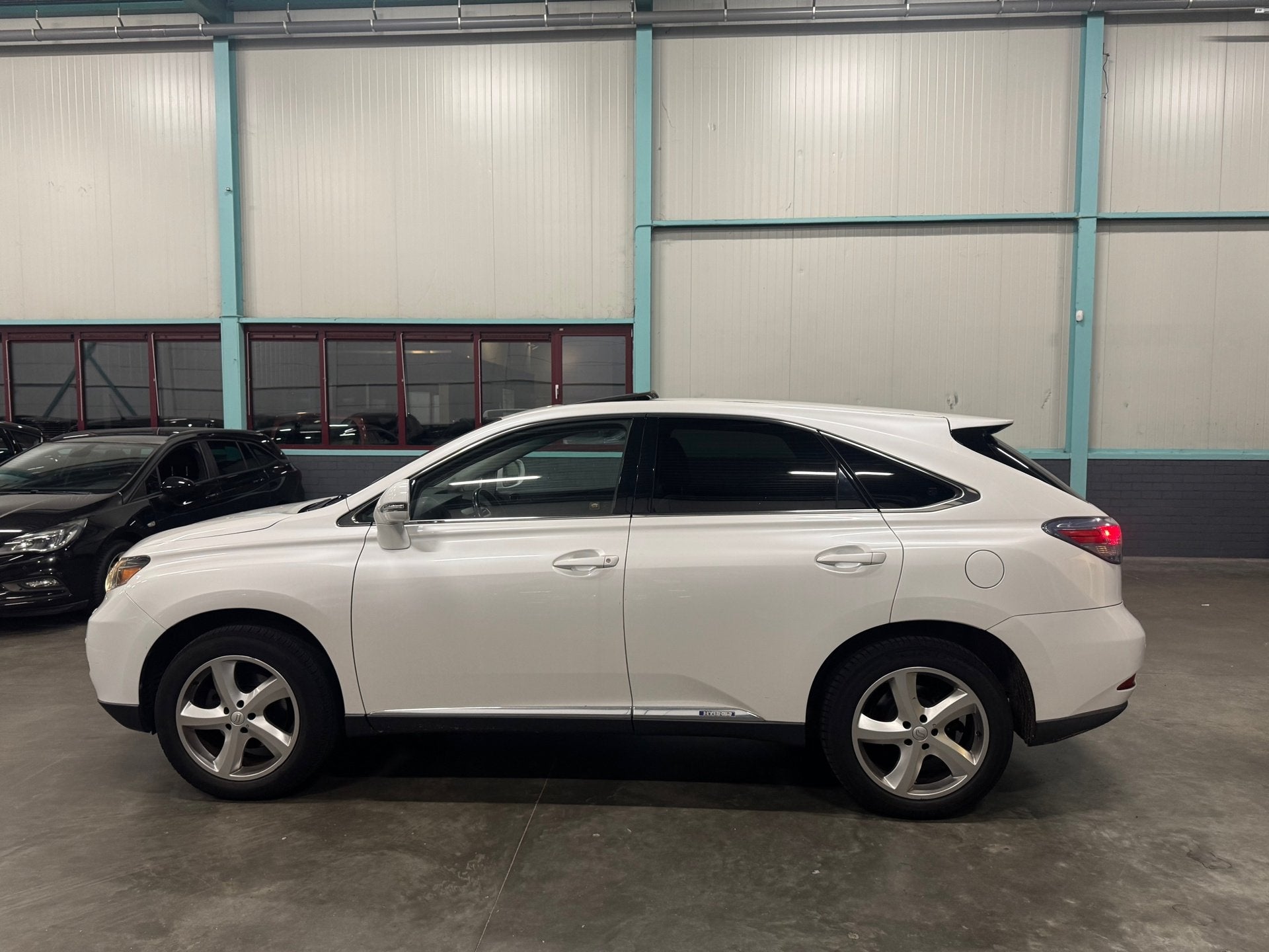 Lexus RX 450h 4WD Luxury DAK LEDER CAMERA CRUISE MEMORY VOL, Automaat, 249 pk, Gebruikt, 2000 kg