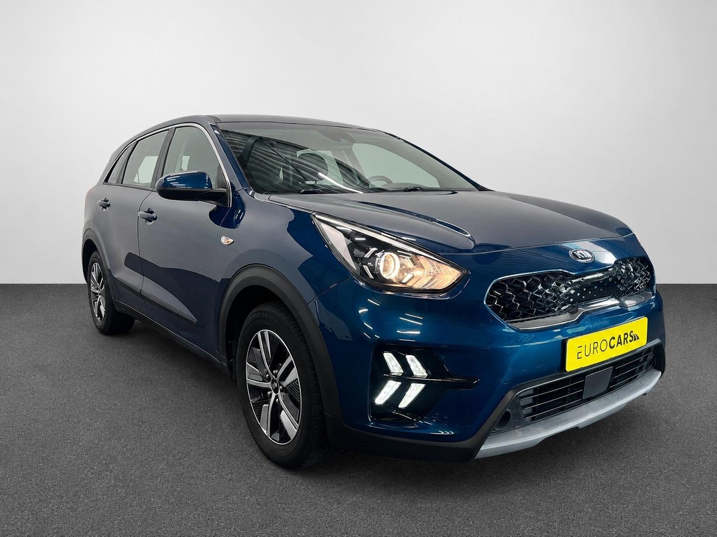 Kia Niro 1.6 GDi Hybrid Navi Edition Navigatie Apple Carplay, Auto's, Kia, Gebruikt, 2 kWh, Blauw, Leder en Stof