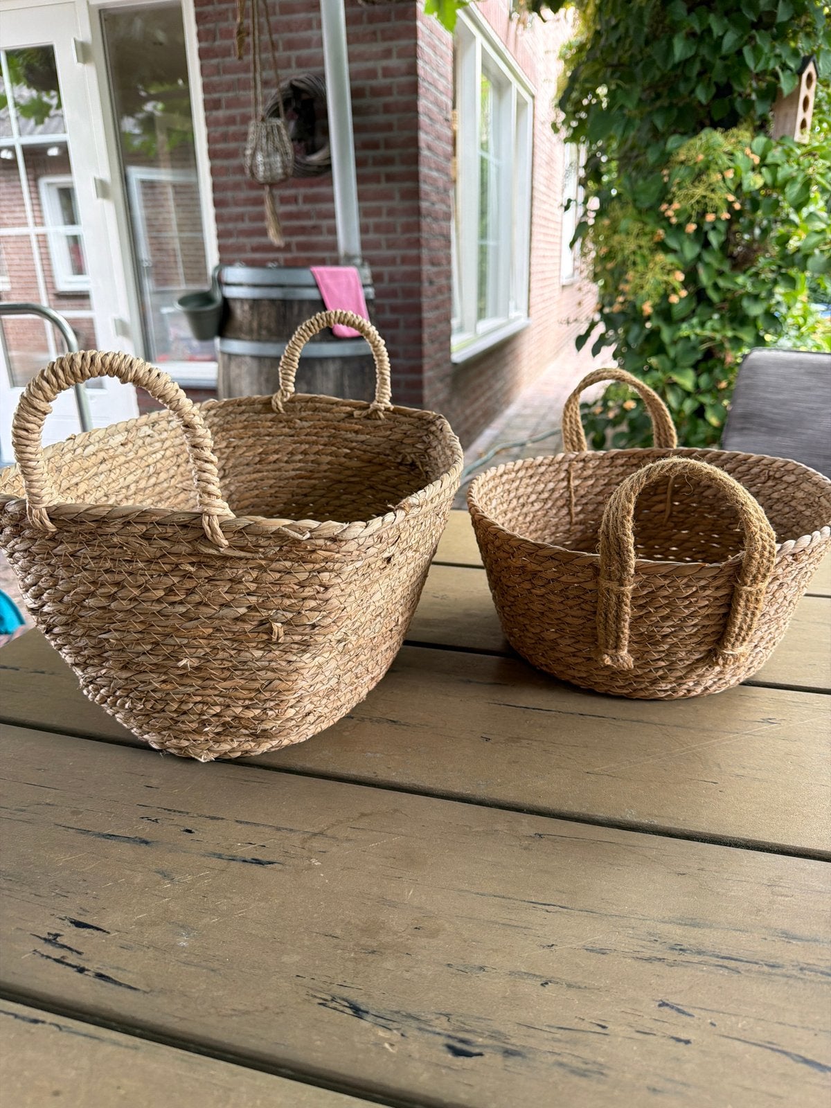 Set van 2 manden met handvatten zeegras, Huis en Inrichting, Woonaccessoires | Schalen en Manden, Gebruikt, Gevlochten, Mand, Ophalen of Verzenden