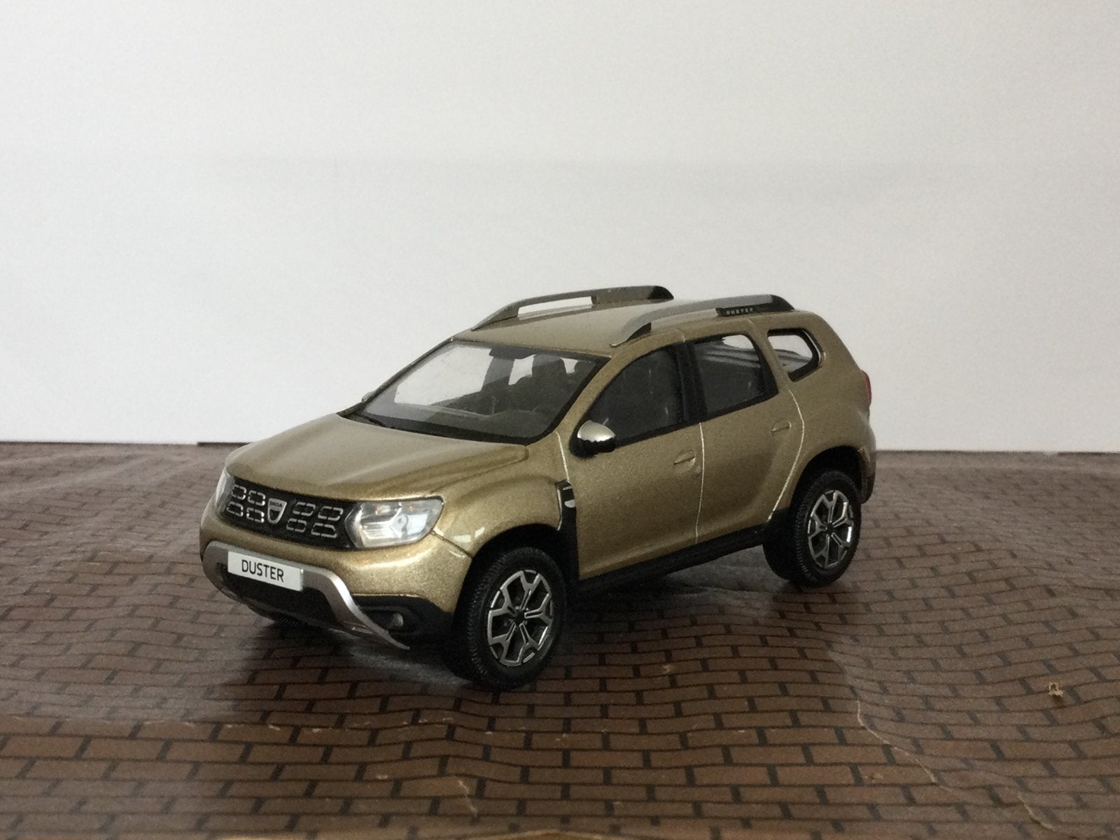 Dacia Duster Stepway 2018 Starlight Bronze 1:43 Norev, Ophalen of Verzenden, Zo goed als nieuw, Auto, Norev