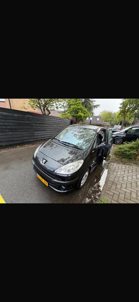 Peugeot 1007 1.4 2005 Zwart, Auto's, Peugeot, Voorwielaandrijving, 1360 cc, 4 cilinders, 4 stoelen