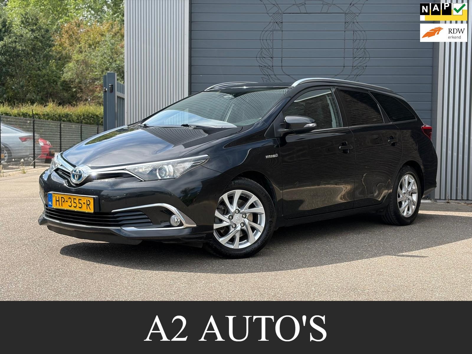 Toyota Auris Touring Sports 1.8 Hybrid Executive Half Leer|C, 28 km/l, Gebruikt, Leder en Stof, Zwart