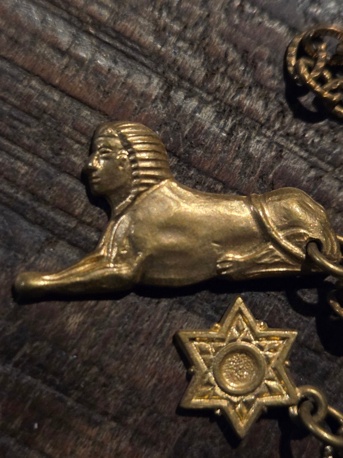 Vintage Egyptisch kettingkje met Sfinx en Davidster, Gebruikt, Ophalen of Verzenden, Goud, Overige materialen