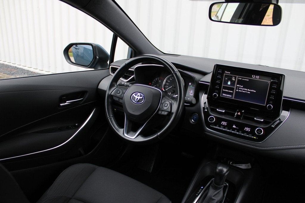 Toyota Corolla Touring Sports 1.8 Hybrid Business | Incl. 12, Auto's, Toyota, 12 maanden, Gebruikt, 4 cilinders, Blauw