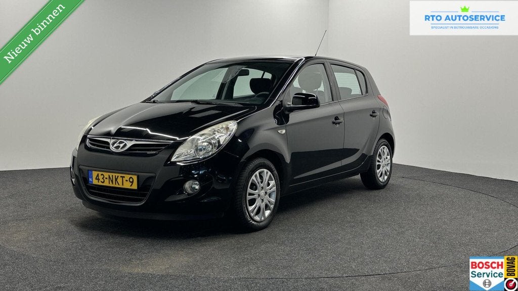 Hyundai i20 1.2i DynamicVersion 5 DEURS AIRCO TREKHAAK., Auto's, Hyundai, Elektrische ramen, Gebruikt, 31 €/maand, 4 cilinders