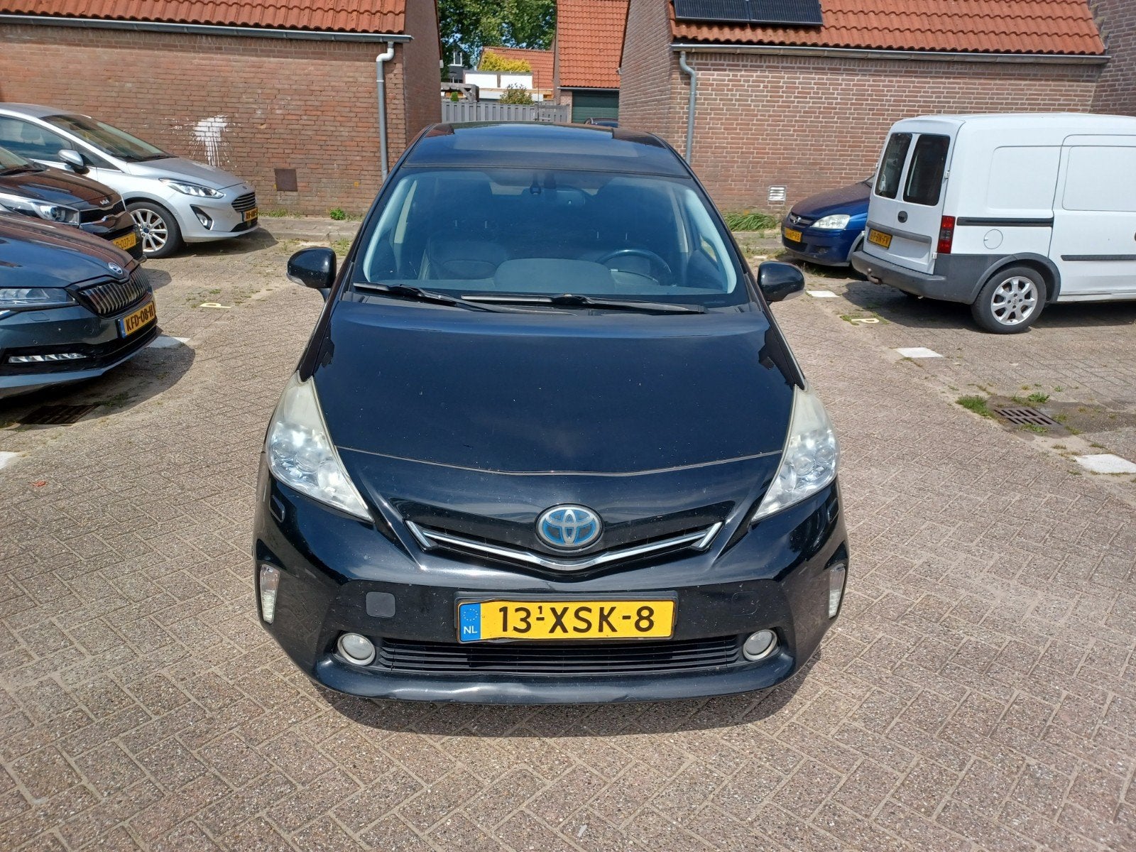 Toyota Prius Wagon 1.8 Full Hybrid 136PK Aut 96g 2012 Zwart, Auto's, Toyota, Zwart, 4 cilinders, 7 stoelen, Zwart