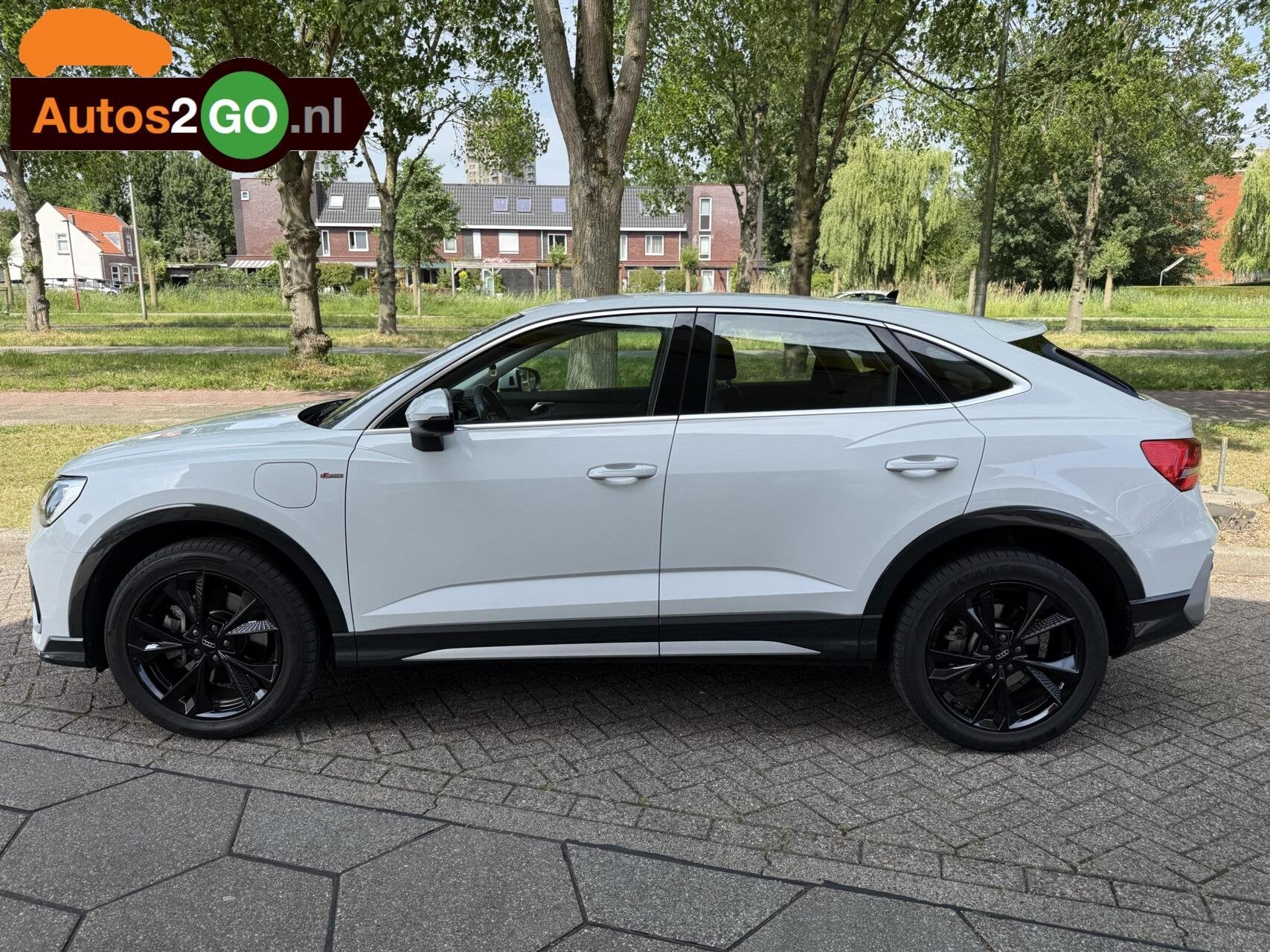 Audi Q3 Sportback 45 TFSI e S edition I Leder I Apple Carpla, Auto's, Audi, Gebruikt, Euro 6, Met garantie (alle), Wit