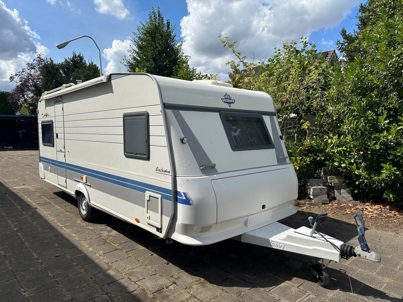 Hobby 540 caravan met luifel, zeer nette staat, Vast bed, Rondzit, Hobby, Schokbreker