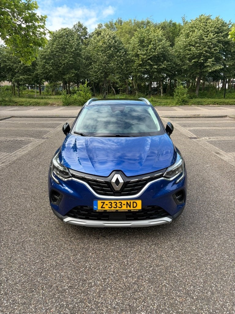 Renault Captur E-tech Plug-in Hybrid 160pk Aut 2021 Blauw, Auto's, 750 kg, Blauw, Leder en Stof, Plug-in hybride