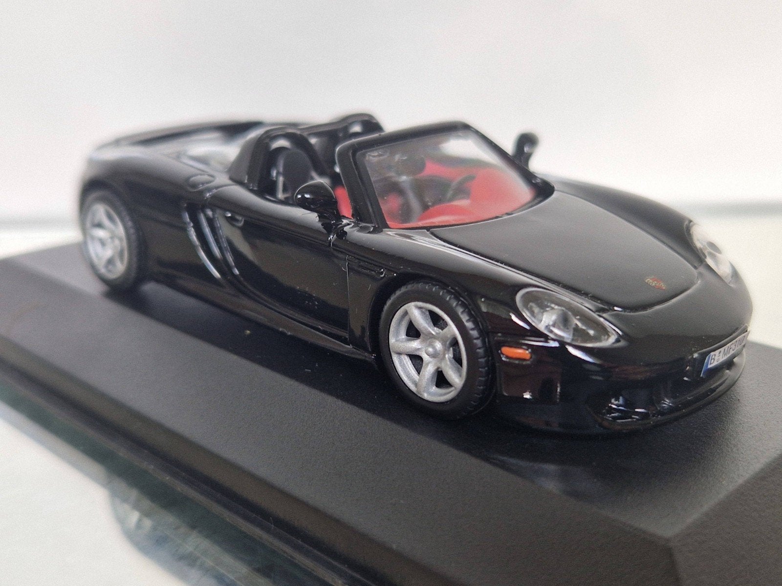 Porsche Carrera GT modelauto - Zwart met rood interieur, Ophalen of Verzenden, Zo goed als nieuw, Auto, Overige merken