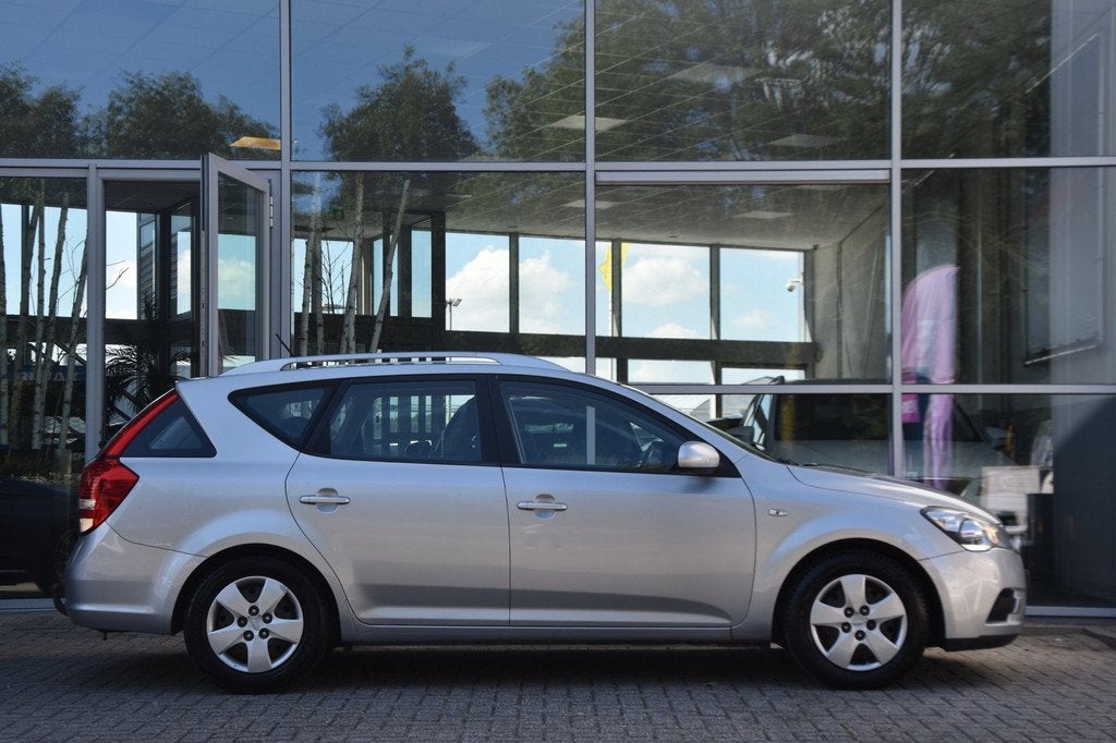 Kia Cee'd Sporty Wagon 1.4 CVVT | Airco | Trekhaak | Cruise, Auto's, Kia, Voorwielaandrijving, Stof, Gebruikt, Zwart