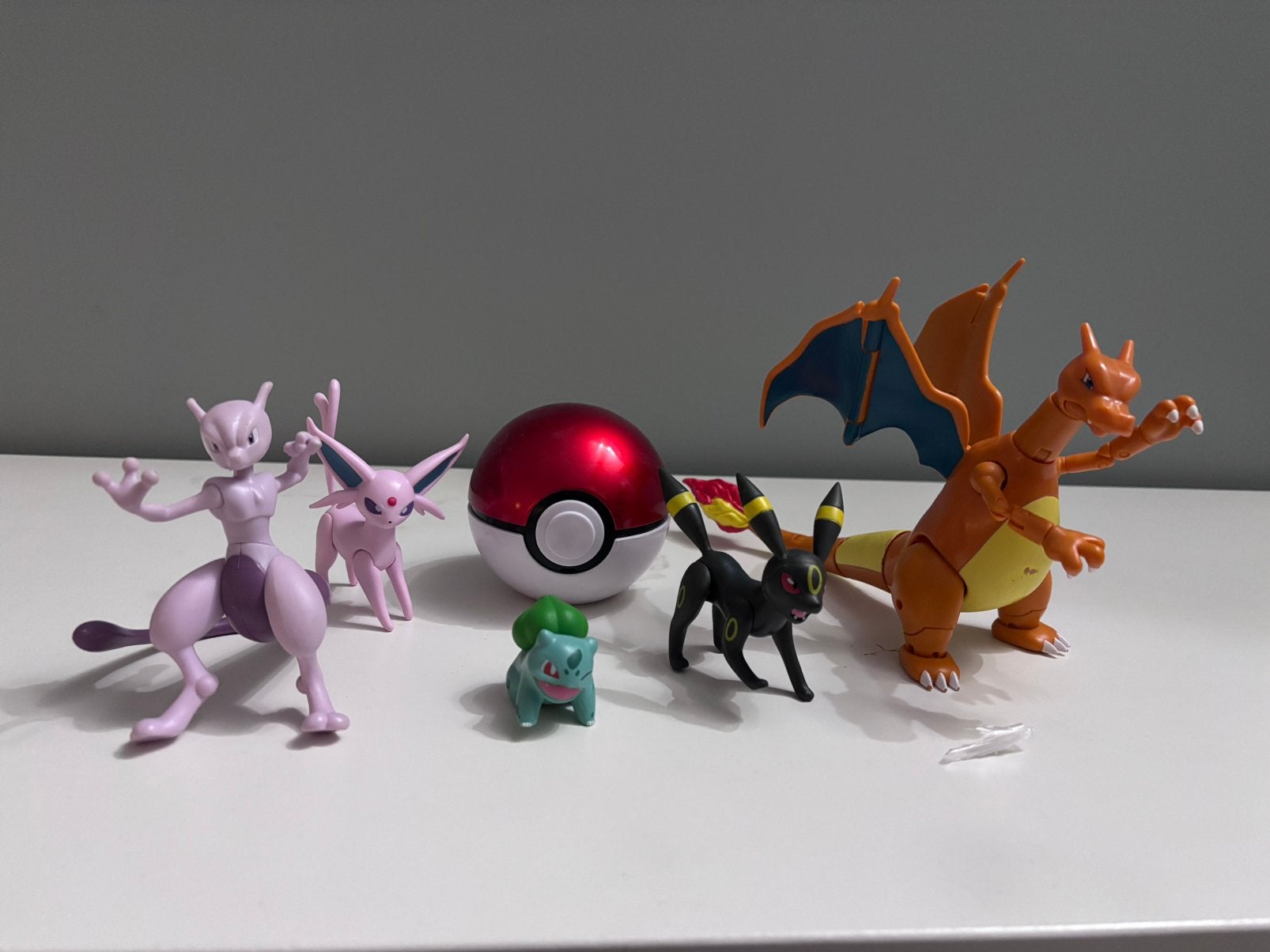 Pokemon figuren en Pokémon Trainer Guess Legacy bal, Ophalen, Zo goed als nieuw