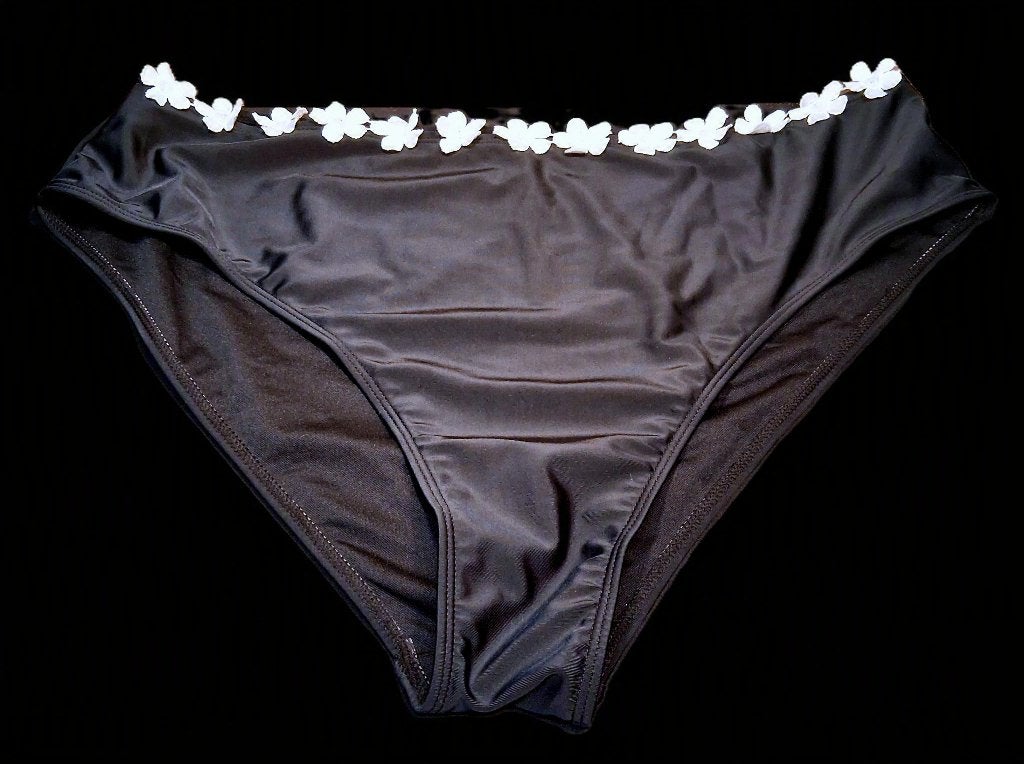 Zwart bikini broekje met witte madeliefjes 50-52, Kleding | Dames, Ophalen of Verzenden, Nieuw, Zwart, Lingerie of Zwemkleding