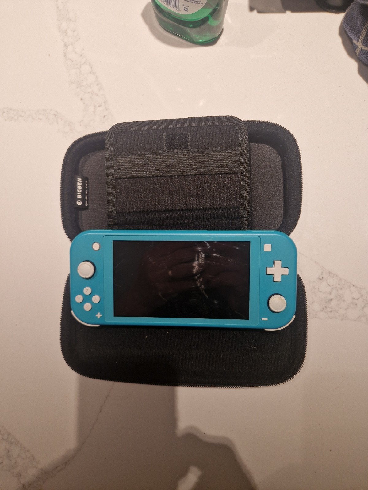 Nintendo Switch Lite Turquoise met hoes en oplader, Spelcomputers en Games, Met games, Ophalen of Verzenden, Zo goed als nieuw