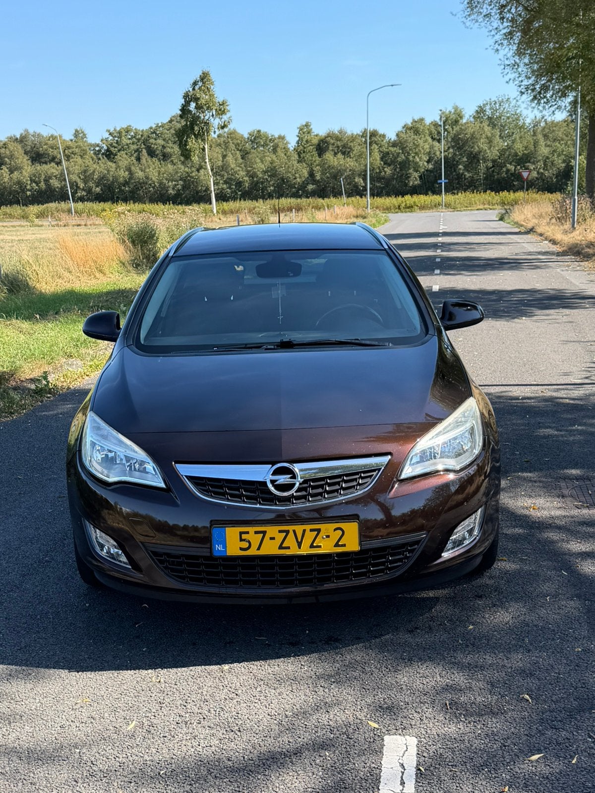 Opel Astra 1.4 Turbo 88KW ST 2013 Bruin, Voorwielaandrijving, Euro 5, Stof, Zwart