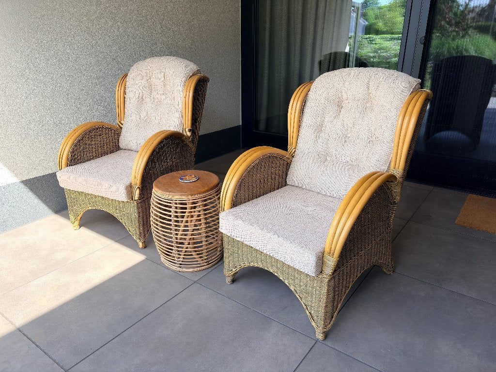 Rotan fauteuil, honing kleur. 2 stuks incl hocker, Ophalen, 75 tot 100 cm, Stof, Zo goed als nieuw