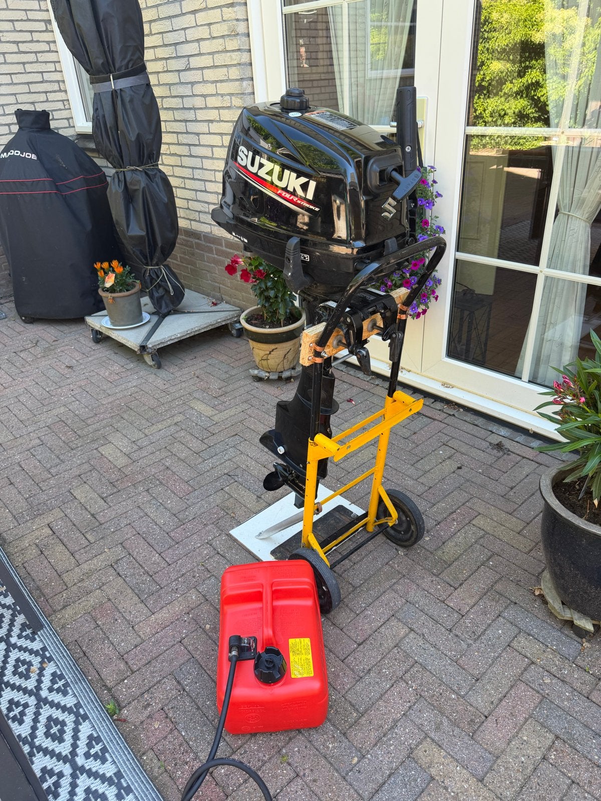 Suzuki DF6A Buitenboordmotor - Zo goed als nieuw, Watersport en Boten, Ophalen, 5 tot 10 pk, Viertaktmotor, Zo goed als nieuw