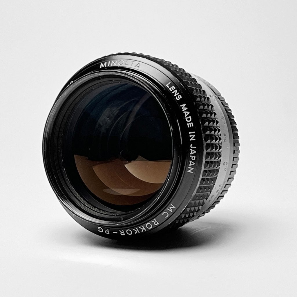 Minolta Rokkor MC 58mm 1.2 PG  "The Hawkeye" + org. zonnekap, Audio, Tv en Foto, Fotografie | Lenzen en Objectieven, Handmatige focus