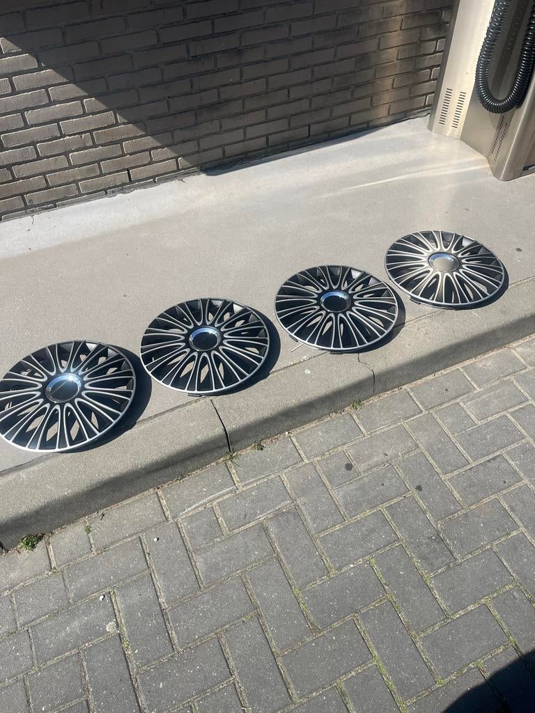 Set van 4 wieldoppen - Zwart/Zilver design, Ophalen of Verzenden, Zo goed als nieuw
