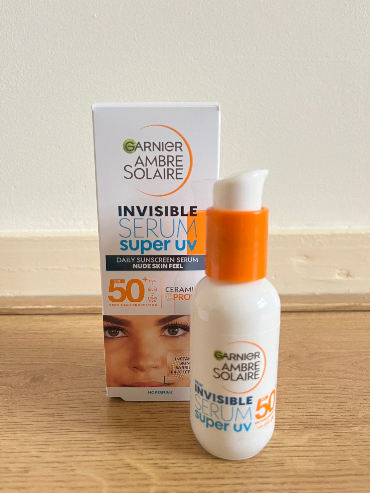 Garnier Ambre Solaire Invisible Serum SPF 50, Ophalen of Verzenden, Nieuw, Gehele gezicht